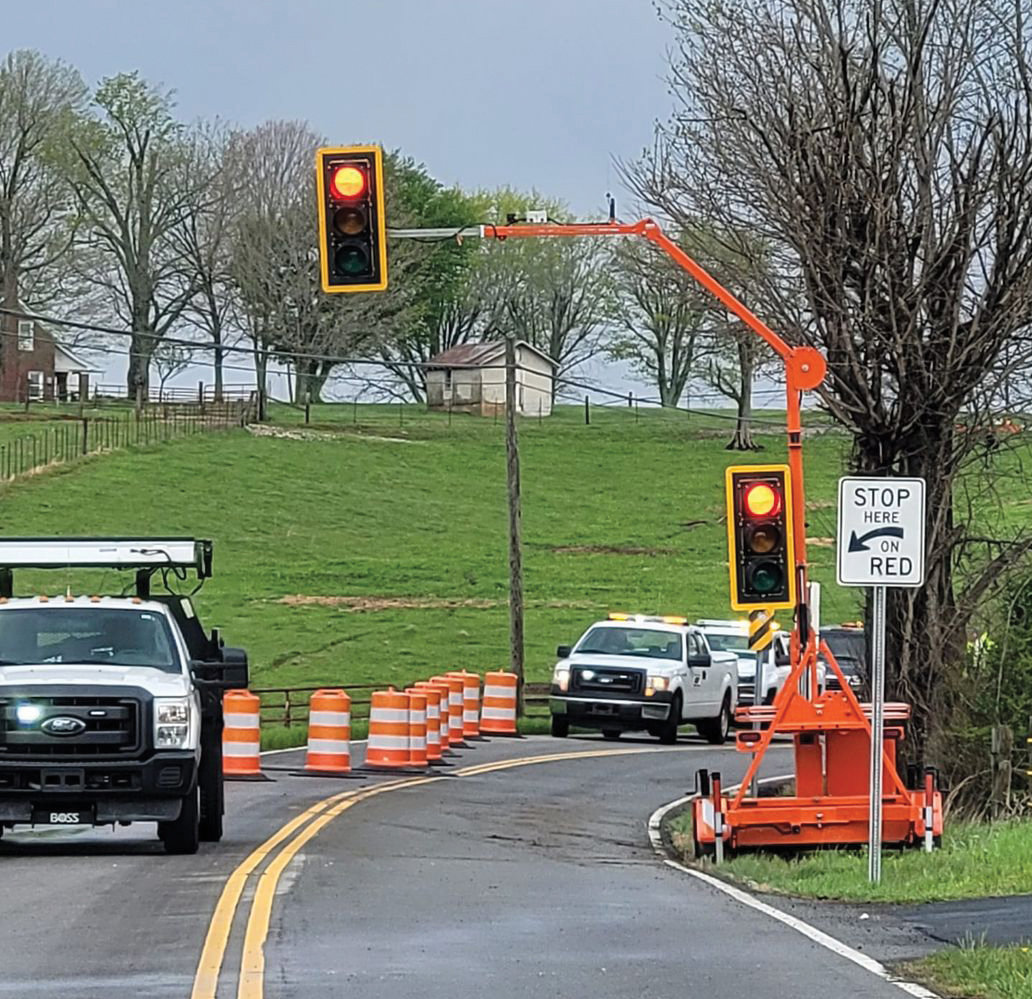 Highway 135 is now open but has been reduced to one lane, and a temporary traffic signal has been installed to control the flow of traffic until repairs can be made.